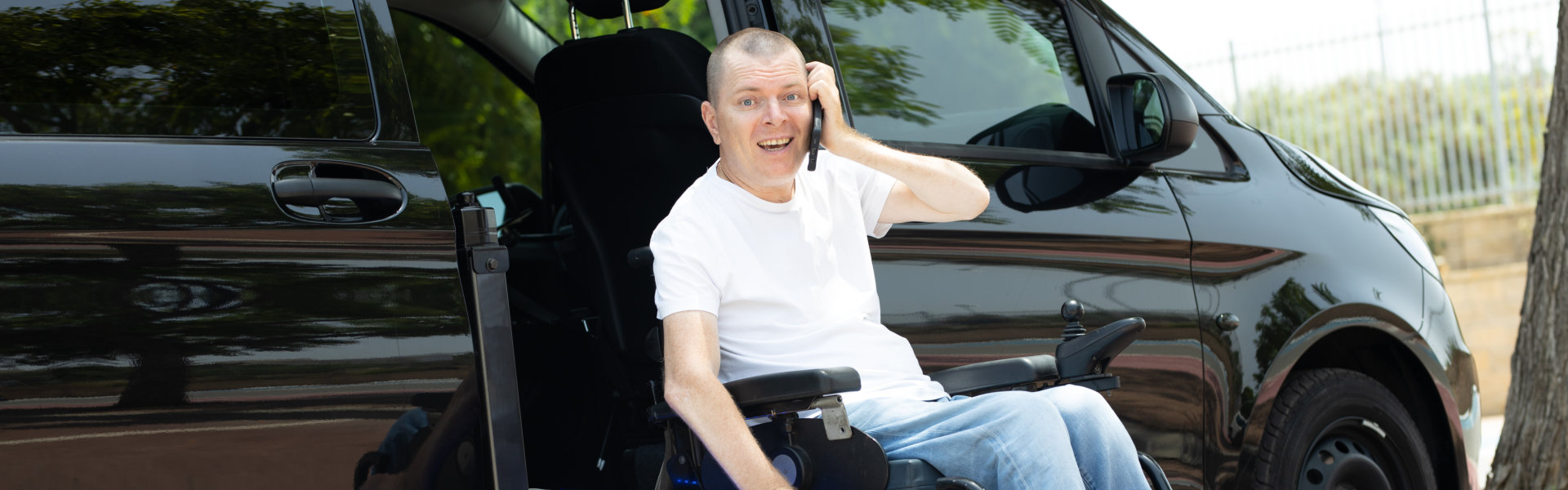 a man getting out of a vehicle calling